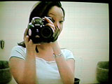 Behind-the-scenes camera operator.